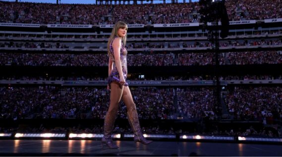 Taylor Swift walking on-stage at the Eras tour
